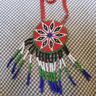 Star Rosette Fringe Medallion